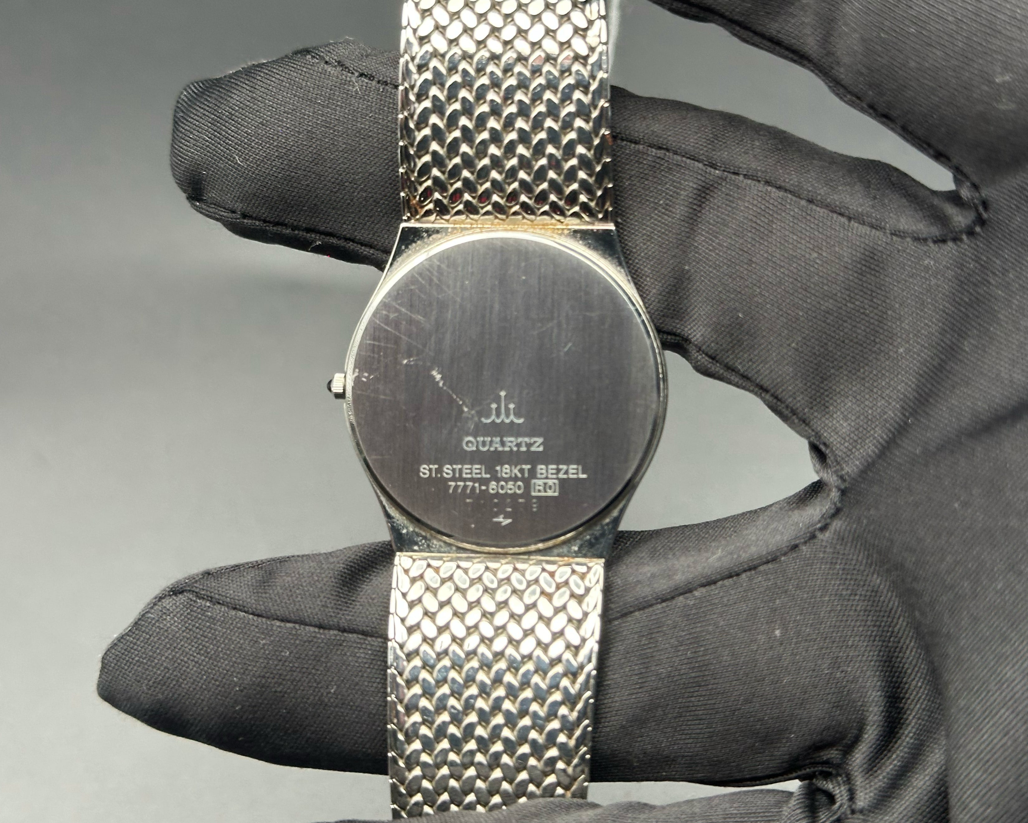 Credor 7771-6050 black dial 18K