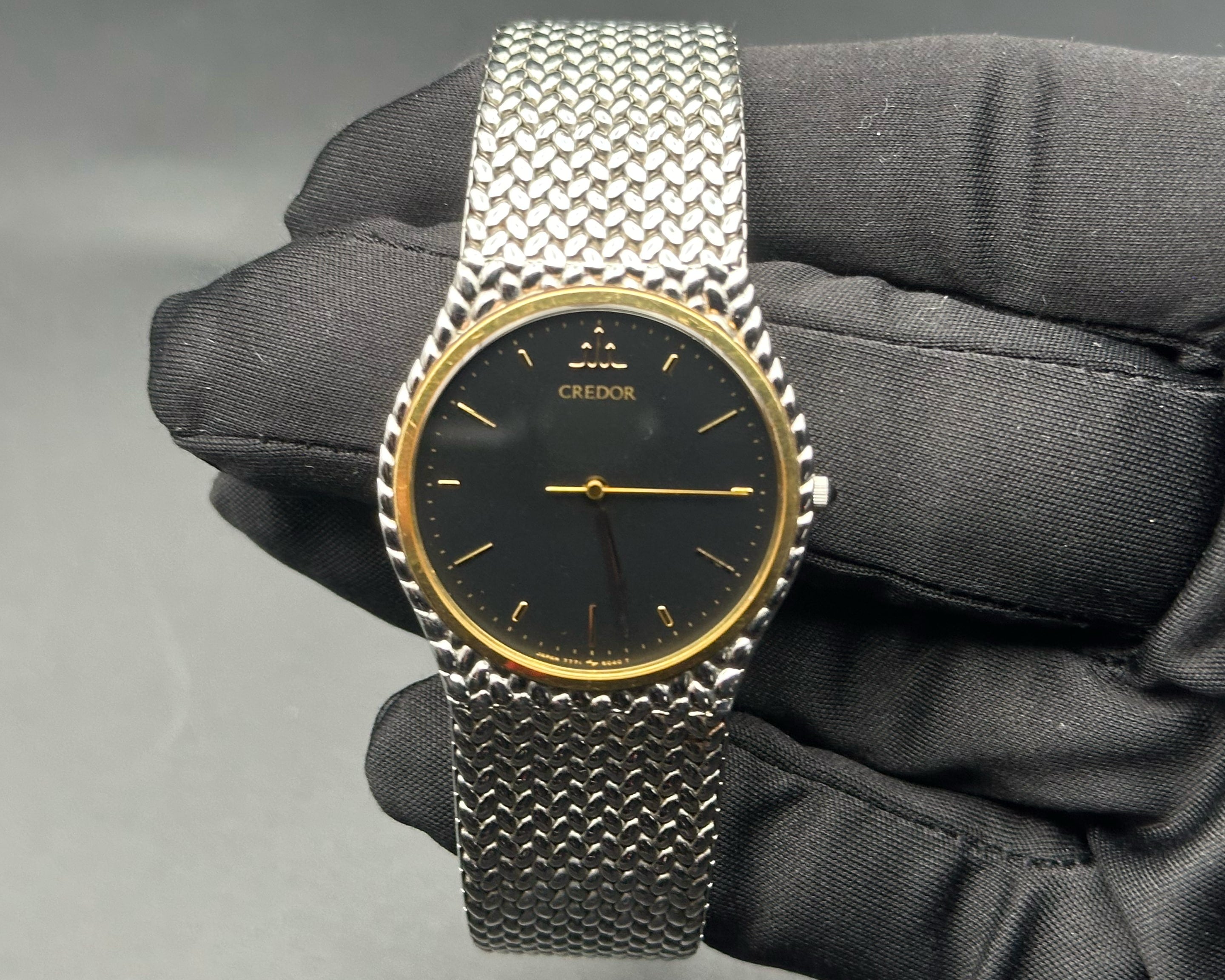 Credor 7771-6050 black dial 18K